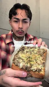 A creator visits Onsu Bakery in London's Chinatown, providing a review of several items including black truffle toast, wagyu curry bun, egg tart, layered toast, matcha latte, and strawberry cakes. The video features a tour of the bakery, close-ups of the food, and the creator's honest feedback on each item.