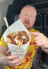 A creator reviews a Greek food truck called 'Mr Chopar' located at the Willowbrook Centre in Bradley Stoke, highlighting the generous portion sizes and quality of the gyros wraps.