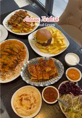 A short, fast-paced montage showcasing a variety of dishes and drinks at Adana Turkish Fusion in Bethnal Green, including hummus, kebabs, chicken, a burger, and cocktails.