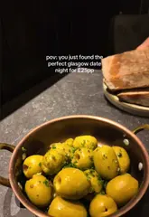 A short, engaging reel showcasing a date night experience at a restaurant in Glasgow. The video features a montage of the interior, various small plates, and the dining experience, set to music with text overlays highlighting the price point.