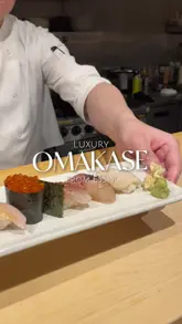 A montage showcasing an omakase dining experience at INÉ in Hampstead. The video features close-up shots of various sushi courses being prepared and served, highlighting the precision and presentation of the food, alongside shots of the intimate counter seating and the restaurant exterior.