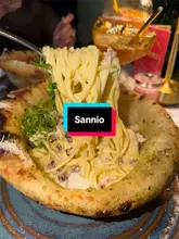 A visually appealing montage showcasing pasta dishes served in edible pizza-crust bowls, cocktails with gold leaf, and desserts at Sannio Italian Restaurant.