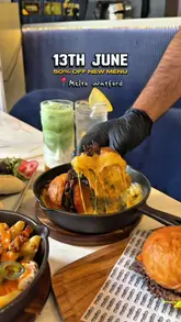 A promotional video for Melto Watford featuring close-up shots of their new menu items, including smash burgers, shawarmas in house-made lavash, and various drinks.