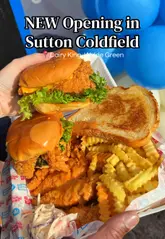 A promotional video for the new Dairy King venue in Sutton Coldfield, showcasing their fried chicken combo meals, including tenders, burgers, and signature sauce. The video uses close-up shots to highlight the texture and quality of the food, aimed at attracting local customers for their grand opening.