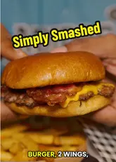 A fast-paced review of a burger, wings, and milkshake at Simply Smashed, highlighting a £10 meal deal and specific World Cup promotional offers.