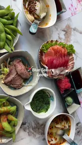 A quick, visually-driven tour of Blue Sakura in Leeds, highlighting the all-you-can-eat sushi ordering process via tablet and showcasing a variety of dishes including sashimi, maki, tempura, and bao buns.