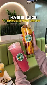 A promotional reel for Habibi Juice in Birmingham, featuring a montage of their fresh juices, loaded milkshakes, and various desserts like milkcakes and tiramisu. The video highlights the vibrant interior and the presentation of the food and drinks.