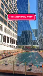 A short, informative reel showcasing the Sea Lanes swimming pool in Canary Wharf. The video features various shots of the pool, the surrounding deck area, and people swimming, accompanied by text overlays detailing the venue's opening hours and entry price.