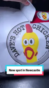 A short, fast-paced promotional video showcasing the menu at the new Dave's Hot Chicken location in Newcastle, featuring close-ups of their signature chicken tenders, fries, and burger with dipping sauce.