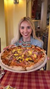 A review of Scalini in Belfast, showcasing the interior, menu, and a variety of dishes including arancini, carbonara, pizza, and desserts.