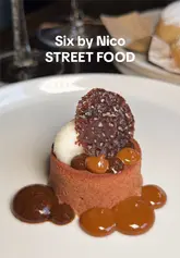 A fast-paced, visually appealing reel showcasing a 10-course street food-themed tasting menu at Six by Nico, featuring close-ups of various dishes and cocktails.