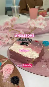 A first-person vlog documenting a cake painting workshop experience in Glasgow. The video shows the provided tools, the painting process, the mocktails served, and the final decorated cakes, highlighting the social and creative nature of the activity.