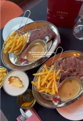 A short, music-led montage showcasing a steak and bottomless fries meal at Jasper in Leeds, featuring close-ups of the food, cocktails, and the restaurant's interior.