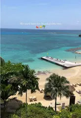 A short, aesthetic montage showcasing a relaxing morning at a Sandals resort, featuring ocean views, a breakfast spread on a balcony, and tropical scenery.