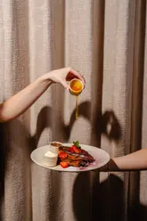 A behind-the-scenes look at a professional photography session at Habbibi restaurant in Leeds, featuring high-quality, cinematic shots of various dishes and cocktails.