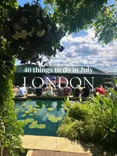 A bright, sunny, high-quality photograph taken at the Wimbledon tennis championships, featuring a view of the courts and spectators from behind a pond and foliage. The image serves as a cover for a 'things to do in London' listicle.