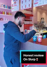 A creator visits a 'dirty soda' shop called Slurp, showcasing the vibrant interior and reviewing two of their signature drinks.