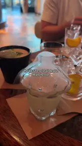 A short, visually polished reel showcasing a cocktail and food deal at a stylish venue in Manchester. The video features quick cuts of cocktails, Mediterranean-style small plates, and the venue's interior, clearly communicating the price point and offer.