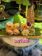 A high-quality, cinematic montage showcasing the interior, cocktails, and various dishes at The Ivy Asia. The video uses smooth transitions and atmospheric lighting to present the venue as a stylish and desirable dining destination.