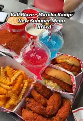 A promotional video for Biggy's in Ilford, highlighting their new summer menu, which includes the 'Bali Blaze' chicken burger and a variety of matcha-based drinks. The creator reviews the items, providing commentary on the flavors and textures.