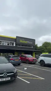 A creator visits Musgrave MarketPlace to stock up on drinks and snacks for a movie night, showcasing the wide variety of alcohol and party supplies available in the store.