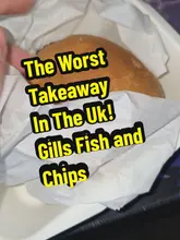 A direct-to-camera review of a takeaway meal from Gills Fish & Chips, where the creator evaluates the quality of a cheeseburger, saveloy, chips, curry sauce, mushy peas, and fish, providing individual ratings for each item.