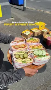 A fast-paced, enthusiastic promotional video showcasing a variety of NYC-style bagels and drinks at First Street Bagels in Manchester. The creator highlights the freshness of the bagels and the halal options available, providing a clear overview of the menu.