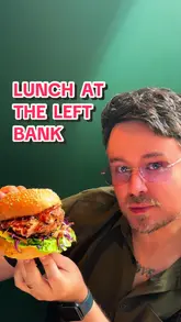 A couple visits The Left Bank in Glasgow, showcasing the venue's interior, cocktails, and a variety of dishes including calamari, chicken satay, a burger, and a peanut butter panna cotta.