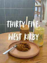 A short, aesthetic video showcasing new menu items at Thirty Five in West Kirby, including a custard cream matcha, a maple pretzel latte, and a maple pretzel cookie.