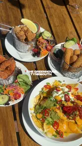 A vlog-style review of The Greenhouse in Tynemouth, featuring a variety of casual pub food, cocktails, and iced coffee. The video showcases the venue's outdoor seating area, interior, and menu, while also capturing the creators' day out at the beach.