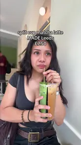 Two creators visit a cafe called MADE in Leeds to try a 'split cup' drink featuring both a matcha latte and a coffee latte. They provide a candid review of the experience, noting the price and their honest opinions on the taste of the drinks.