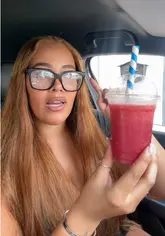 A creator visits Raheem's Juices in Bristol, showcasing the menu and reviewing a fresh fruit juice.