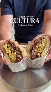 A review of Cultura in Gilnahirk, Belfast, showcasing their brunch menu, including a steak sandwich and blueberry french toast, while highlighting their recent award recognition.