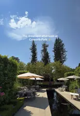 A high-quality, aesthetic montage showcasing a luxury afternoon at Coworth Park. The video features the hotel's grounds, a game of croquet, cocktails, a sophisticated lunch at the TIDE restaurant, and a visit to the on-site ice cream cart. The editing is smooth and professional, emphasizing the premium, relaxing nature of the experience.