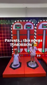 A fast-paced montage showcasing the various interactive zones at Imagine That! in Wigan, including science experiments, water play, slime workshops, and role-play areas, aimed at parents looking for family activities.