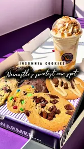 A vibrant vlog-style review of the new Insomnia Cookies location in Newcastle. The creator showcases the variety of cookies, the menu, and the shakes, highlighting the late-night opening hours and the quality of the warm, gooey cookies.