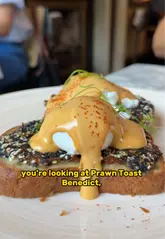 A review of the new brunch menu at Floritz in Dublin, highlighting specific dishes like the Prawn Toast Benedict and the Dirty Martini Spritz, while showcasing the restaurant's stylish interior.