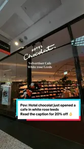 A short, aesthetic video tour of the newly opened Hotel Chocolat cafe at White Rose Leeds, featuring close-ups of ice cream preparation, the cafe interior, and an interactive chocolate quiz screen.