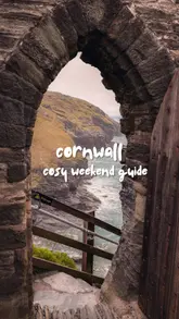 A travel guide showcasing a weekend trip to Cornwall, featuring a stay at Padstow Townhouse and visits to Caffè Rojano, a walled garden cafe, and Four Boys cafe. The video highlights the moody, atmospheric weather and the cosy hospitality of the region.