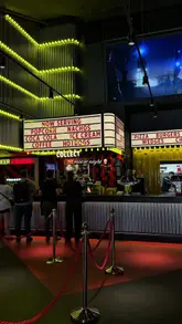 A short, atmospheric tour of a cinema venue, showcasing the concession area, the lobby, and the comfortable seating, set to music.