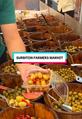 A short, energetic montage showcasing the various stalls at Surbiton Farmers' Market, highlighting fresh produce, artisan breads, cheeses, and prepared foods.