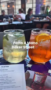 A 'come with me' style video featuring two friends visiting Fatto A Mano on Baker Street. The video captures the exterior, interior, a variety of small plates, pizzas, desserts, and cocktails, providing a comprehensive look at the dining experience.