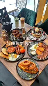 A montage showcasing the brunch menu and interior of Reflexion Lounge in Salford Quays, Manchester, featuring various dishes like pancakes, steak and eggs, and a croissant burger, alongside drinks and waterside views.
