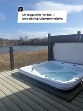 A tour of a dog-friendly lodge at Ullswater Heights in the Lake District, highlighting the hot tub, interior, and dog agility facilities.