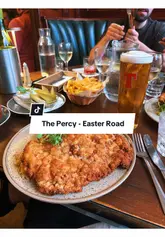 A vlog-style review of The Percy in Leith, featuring a tour of the interior, a look at the menu, and a critique of the Polish cuisine served.