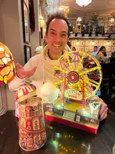 A creator visits Incognito cocktail bar in Kingston, showcasing three highly interactive and visually creative cocktails, including a carnival-themed drink, a butterfly-themed drink, and a video game-themed drink with a claw machine element.