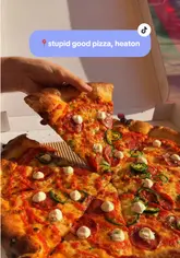 A promotional video for the opening of 'Stupid Good Pizza' in Newcastle, featuring close-up shots of their New York-style pizza and BBQ chicken bites, alongside glimpses of the venue's interior and staff.
