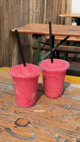 A vlog-style video featuring two friends visiting 'Summer on the Southside' in Newcastle. The video highlights the outdoor seating area under the Tyne Bridge, the bar's drink selection, and the food offerings from the resident street food trader, Baghead.