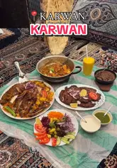 A showcase of Afghan cuisine at Karwan restaurant in Southall, featuring a variety of grilled meats, naan, and traditional dishes, along with a look at the kitchen preparation process.