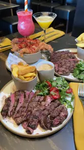 A short, music-led montage showcasing the interior, menu, and food offerings at Edinburgh Prime Steakhouse, highlighting its status as a fully halal venue.